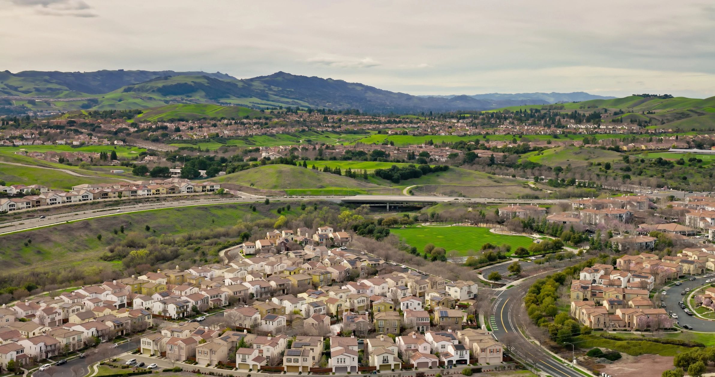 Aerial view of a suburban neighbourhood with many homes